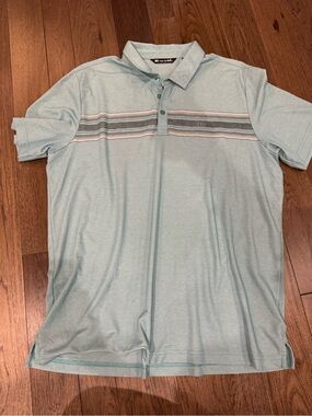 Travis Mathew Blue Golf Polo with Striped Chest Detail